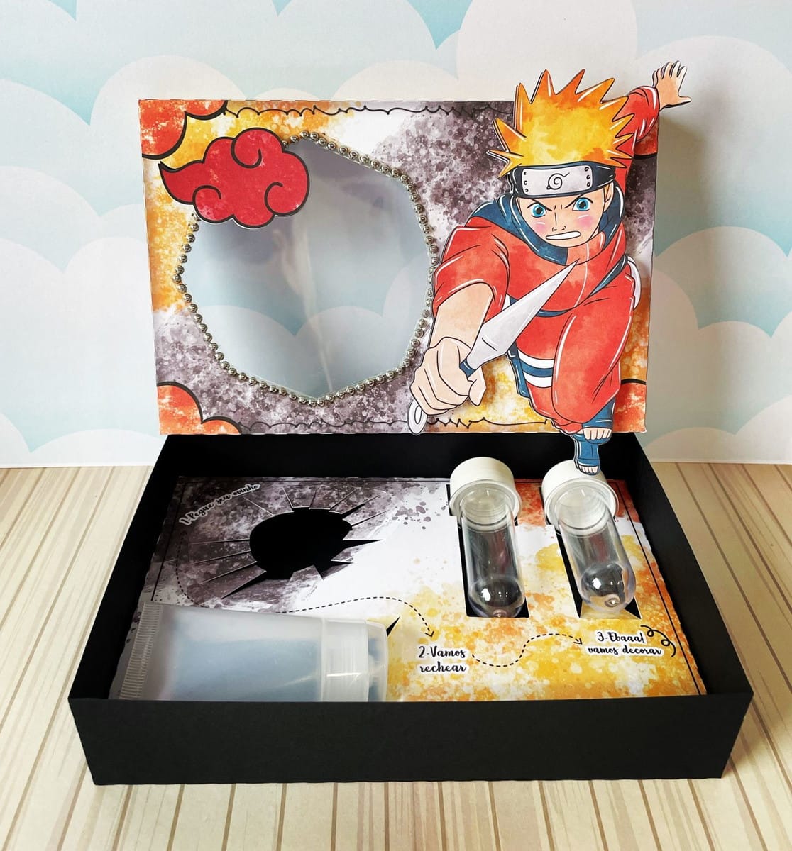 Caixa de Páscoa Naruto Kit Digital PDF PNG e Studio 3 Caixa decorada com personagem de anime e materiais para artesanato.