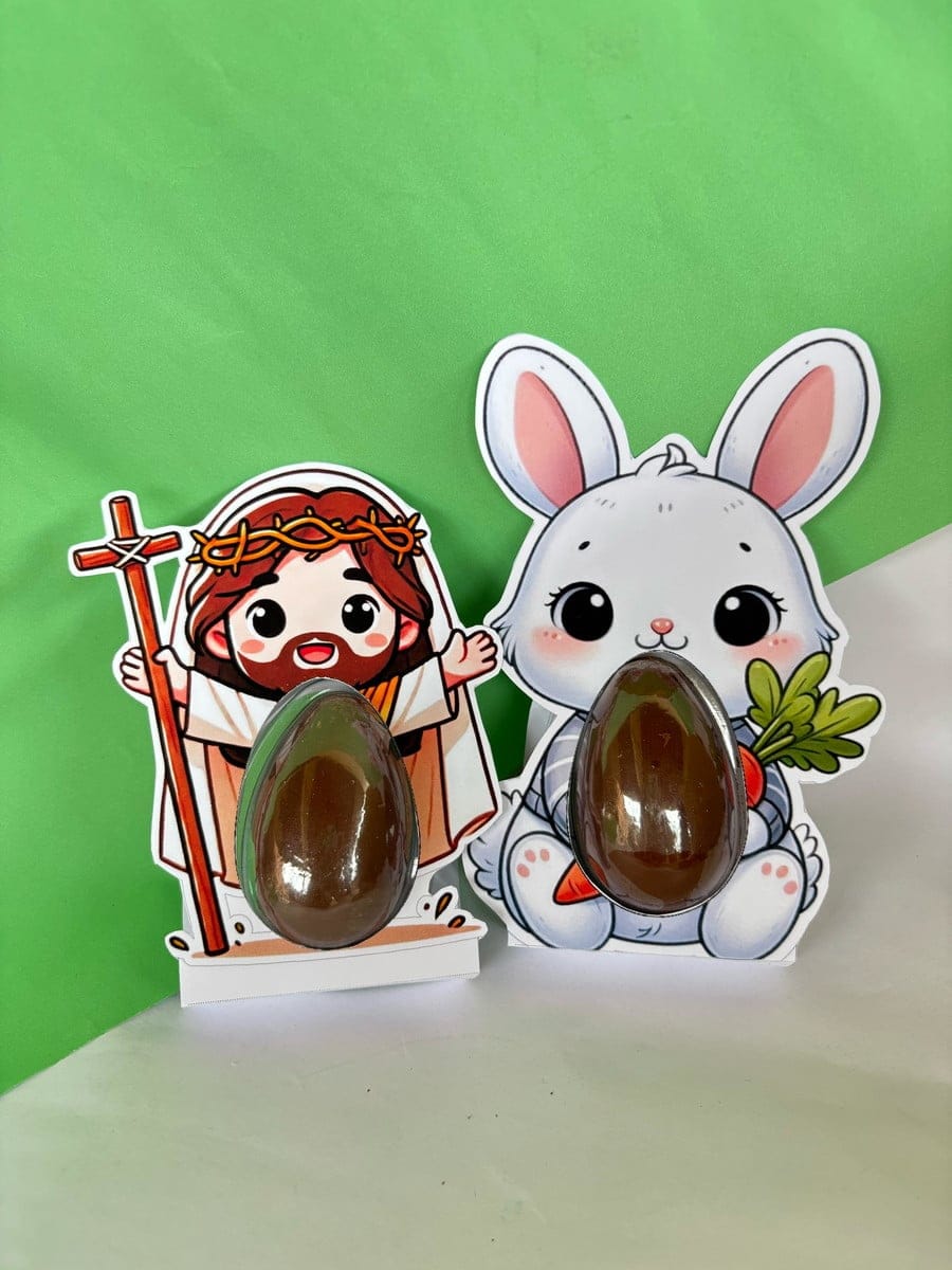 Kit Caixas Páscoa Canva para Corte em Plotter 3 Recortes com design de coelho e figura religiosa, acompanhados por ovos de chocolate.
