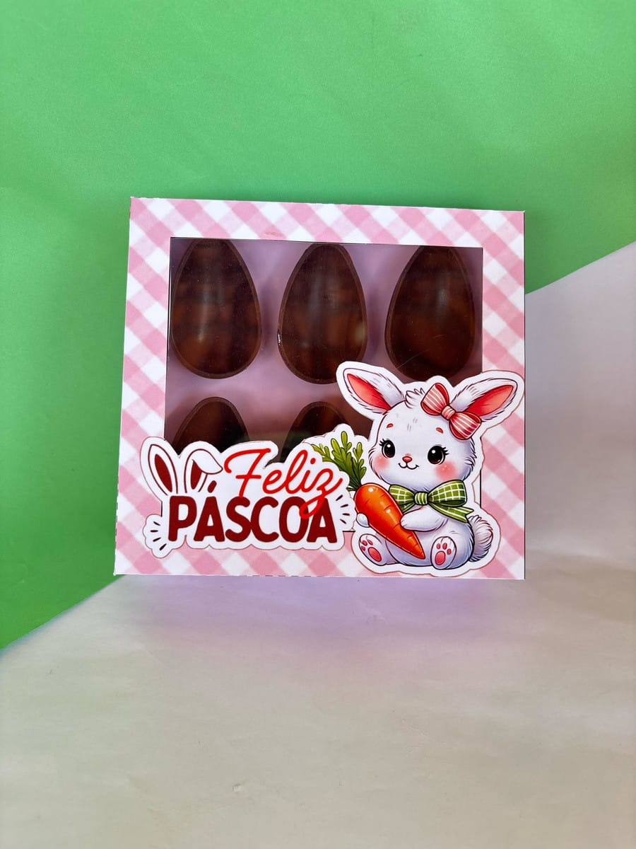 Kit Caixas Páscoa Canva para Corte em Plotter 5 Caixa de Páscoa com coelho, ovos de chocolate e "Feliz Páscoa".
