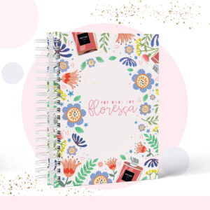 Caderno espiral com capa floral colorida e texto "Por onde for, floresça", arte digital.
