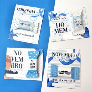 Quatro cartões temáticos azuis com doces embalados e frases motivacionais sobre saúde masculina.