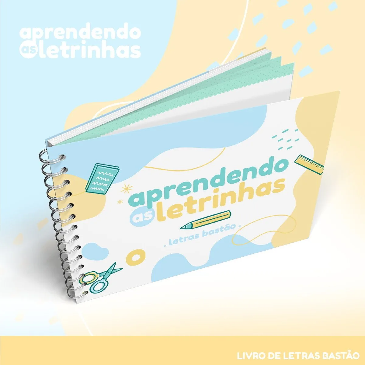 Caderno espiral ilustrado com elementos escolares sobre fundo azul e amarelo pastel.